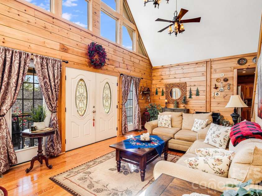 158 Raven Boulevard, Lake Lure, NC 28746.  MLS# CAR4335082, YatesRealty ID 4906. Living room 