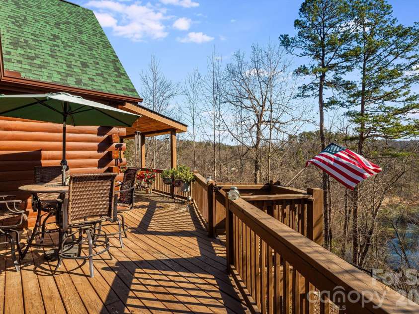 158 Raven Boulevard, Lake Lure, NC 28746.  MLS# CAR4335082, YatesRealty ID 4906. Sit and soak it all in!