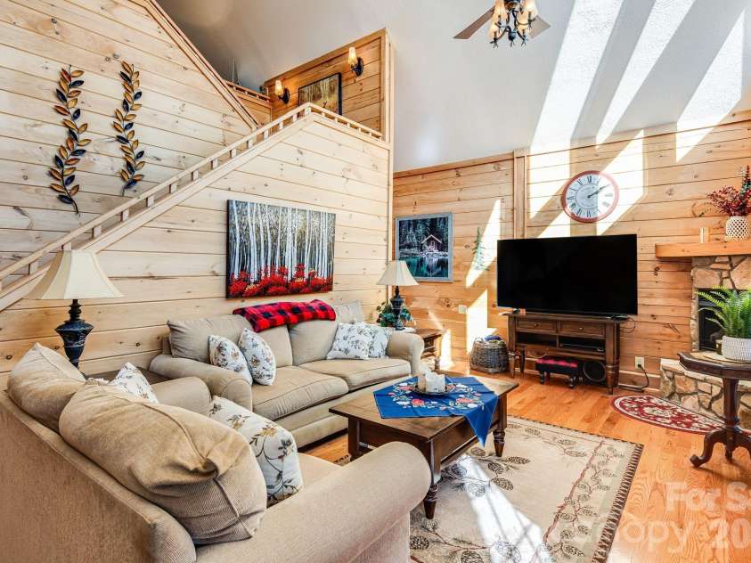 158 Raven Boulevard, Lake Lure, NC 28746.  MLS# CAR4335082, YatesRealty ID 4906. Steps leads to office nook/loft area