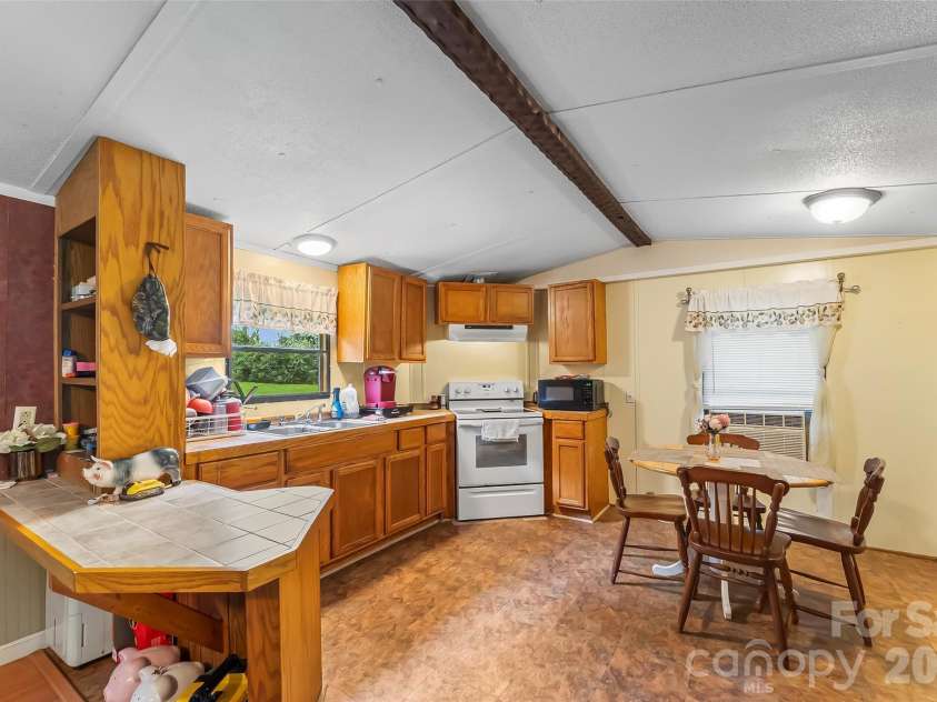 230 JOHNSON HOLLOW Road, Marion, NC 28752.  MLS# CAR4421839, YatesRealty ID 49094. Kitchen/dining room