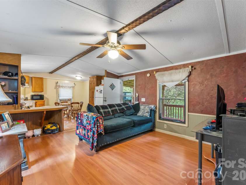 230 JOHNSON HOLLOW Road, Marion, NC 28752.  MLS# CAR4421839, YatesRealty ID 49094. Living room single wide