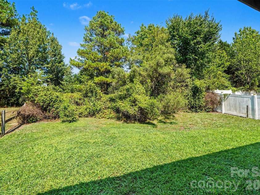 10424 Green Hedge Avenue, Charlotte, NC 28269.  MLS# CAR4421376, YatesRealty ID 49097. Fenced-In Backyard