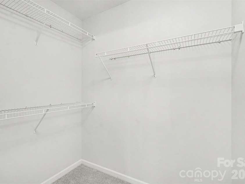 10424 Green Hedge Avenue, Charlotte, NC 28269.  MLS# CAR4421376, YatesRealty ID 49097. Primary Closet