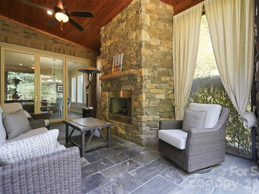 1206 Delaney Drive, Weddington, NC 28104.  MLS# CAR4421166, YatesRealty ID 49098. Covered Back Patio that is also screened in
