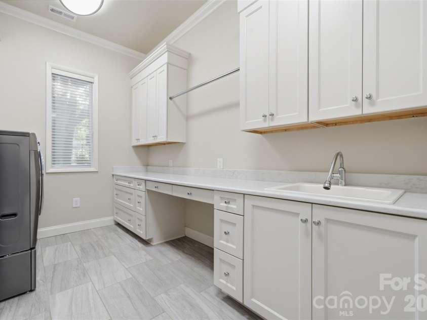1206 Delaney Drive, Weddington, NC 28104.  MLS# CAR4421166, YatesRealty ID 49098. Laundry Room