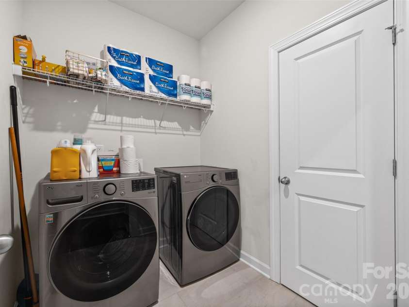 9125 Myrna Drive, Gastonia, NC 28056.  MLS# CAR4421211, YatesRealty ID 49099. Laundry room with direct access from primary closet