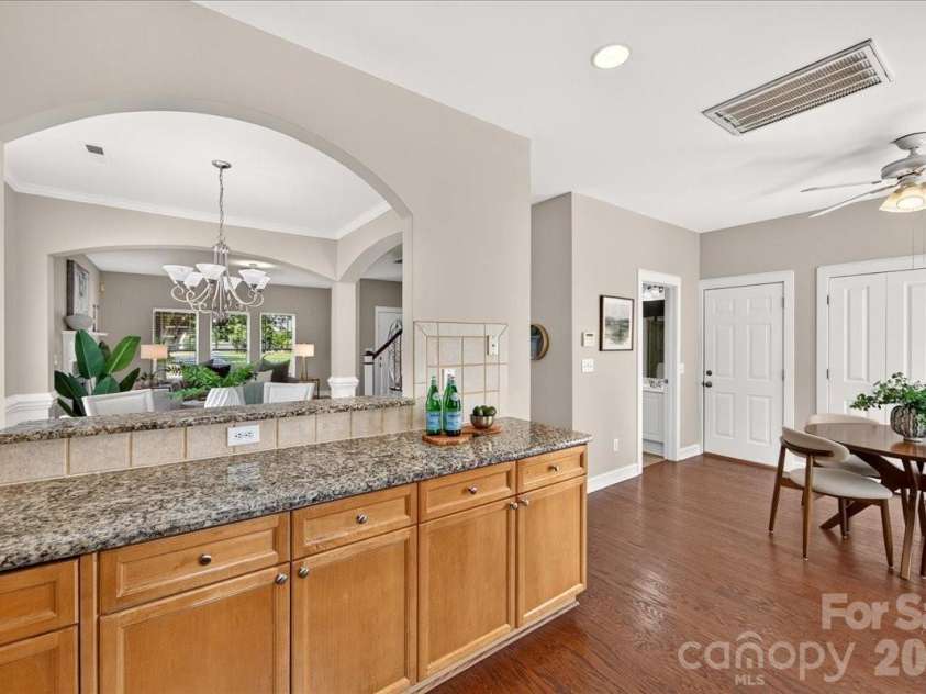 9026 Crusaders Court, Matthews, NC 28105.  MLS# CAR4420940, YatesRealty ID 49102. Additional dining/breakfast area off of kitchen!