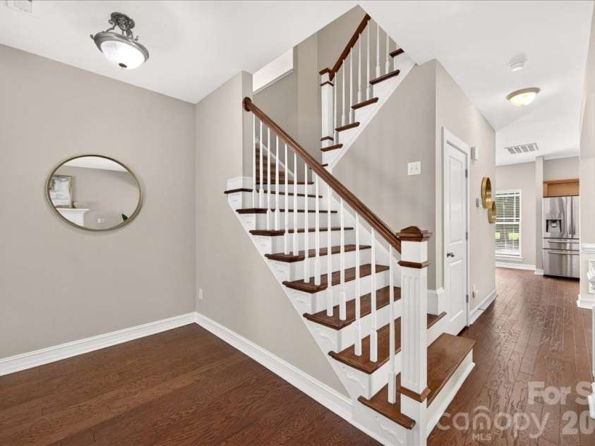9026 Crusaders Court, Matthews, NC 28105.  MLS# CAR4420940, YatesRealty ID 49102. Engineered Hardwoods!