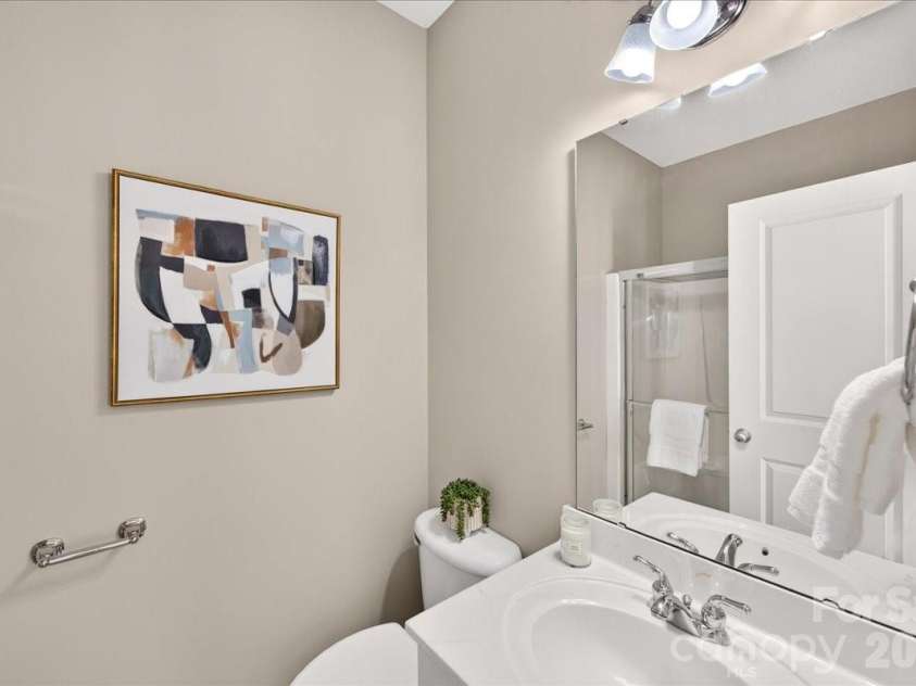 9026 Crusaders Court, Matthews, NC 28105.  MLS# CAR4420940, YatesRealty ID 49102. Full bath on main level