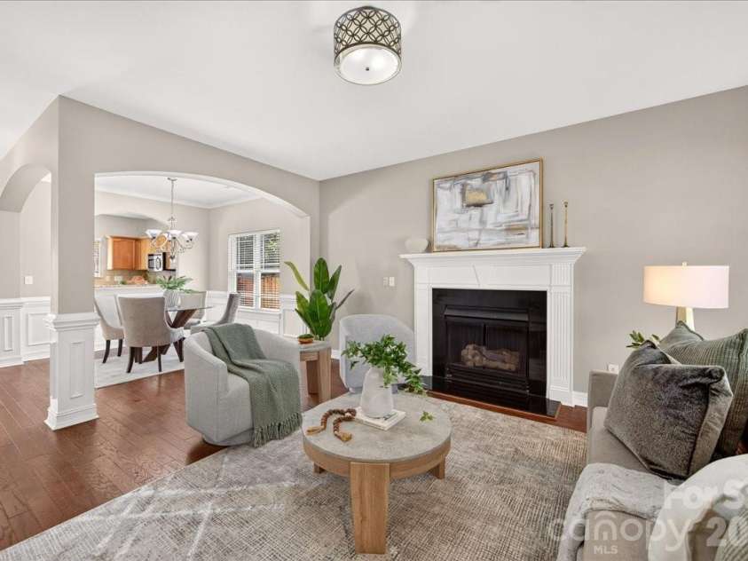 9026 Crusaders Court, Matthews, NC 28105.  MLS# CAR4420940, YatesRealty ID 49102. Gas log fireplace!