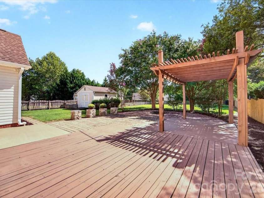 9026 Crusaders Court, Matthews, NC 28105.  MLS# CAR4420940, YatesRealty ID 49102. Great entertaining space!