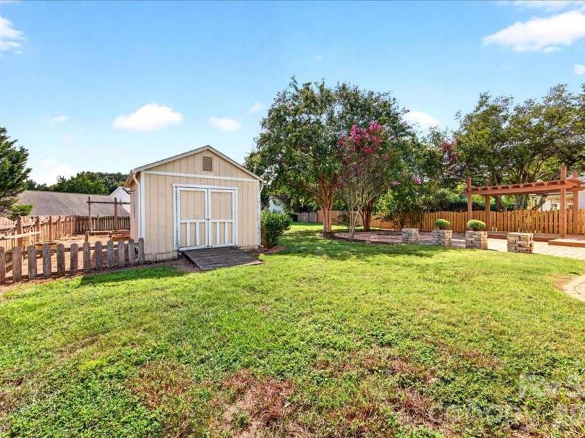 9026 Crusaders Court, Matthews, NC 28105.  MLS# CAR4420940, YatesRealty ID 49102. Large open backyard!