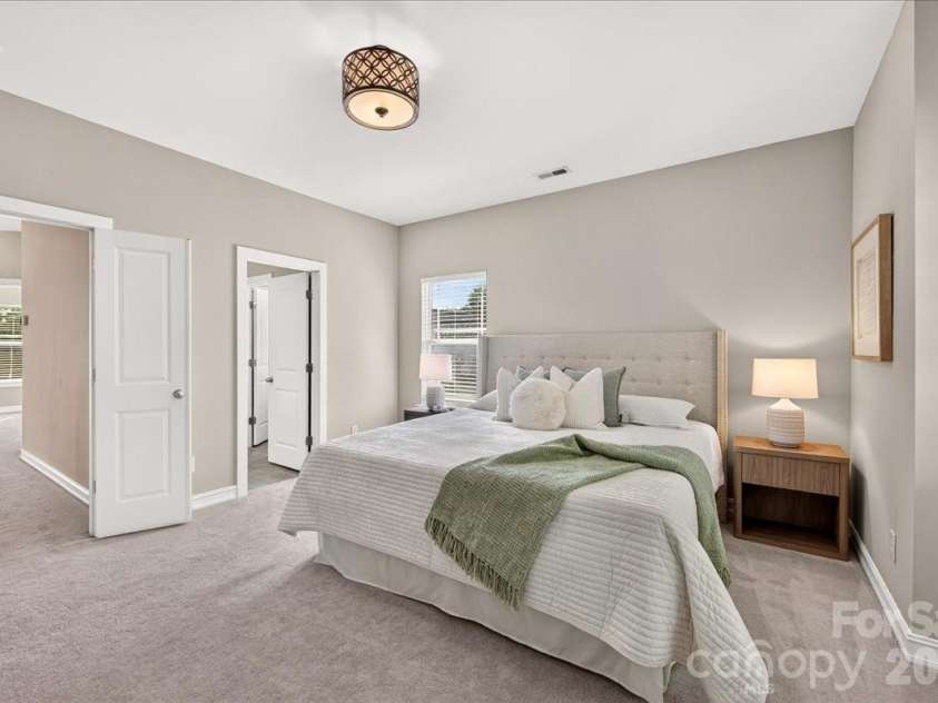 9026 Crusaders Court, Matthews, NC 28105.  MLS# CAR4420940, YatesRealty ID 49102. Large primary bedroom with great natural light!