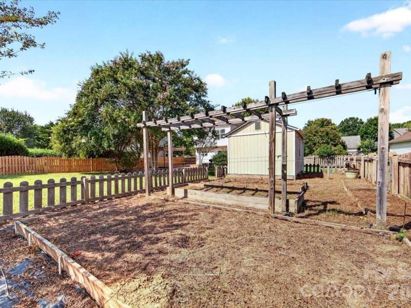 9026 Crusaders Court, Matthews, NC 28105.  MLS# CAR4420940, YatesRealty ID 49102. Shed too!