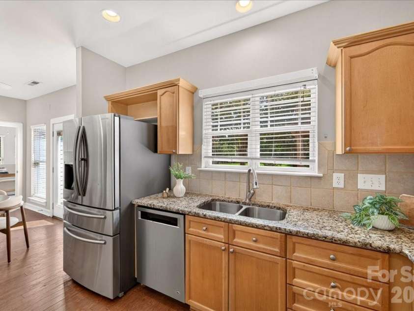 9026 Crusaders Court, Matthews, NC 28105.  MLS# CAR4420940, YatesRealty ID 49102. SS appliances!