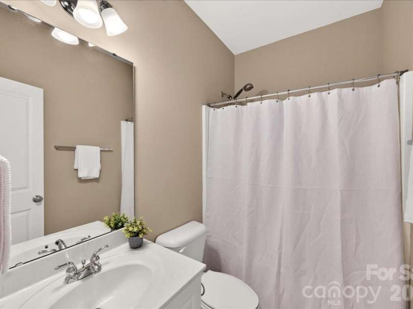 9026 Crusaders Court, Matthews, NC 28105.  MLS# CAR4420940, YatesRealty ID 49102. Third full bath!