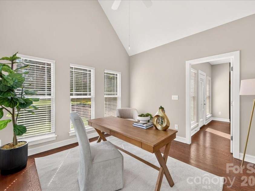 9026 Crusaders Court, Matthews, NC 28105.  MLS# CAR4420940, YatesRealty ID 49102. Vaulted ceilings give this room an open feel!