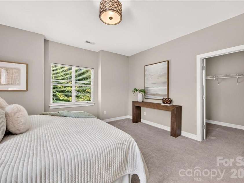 9026 Crusaders Court, Matthews, NC 28105.  MLS# CAR4420940, YatesRealty ID 49102. Walk in closet!