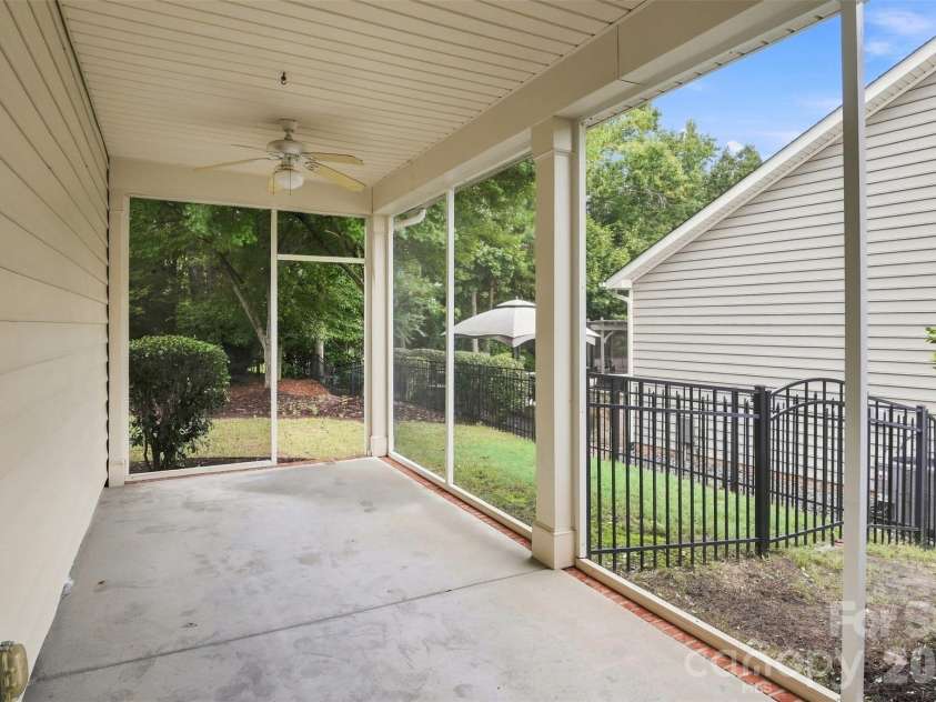 155 Black Mountain Drive, Fort Mill, SC 29708.  MLS# CAR4420425, YatesRealty ID 49113. Side screen in porch