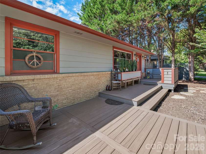 30 Maney Avenue, Asheville, NC 28804.  MLS# CAR4420357, YatesRealty ID 49114. A welcoming front deck