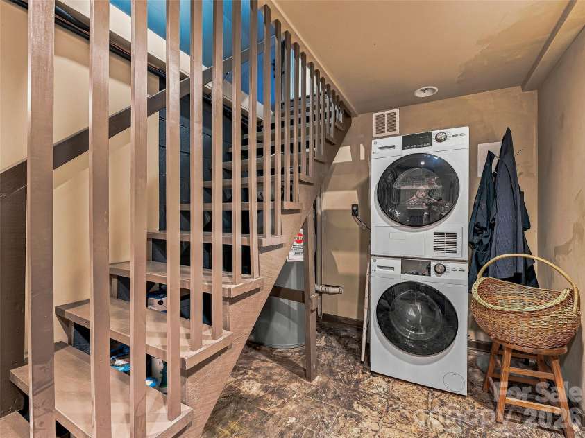 30 Maney Avenue, Asheville, NC 28804.  MLS# CAR4420357, YatesRealty ID 49114. Laundry room on the lower level