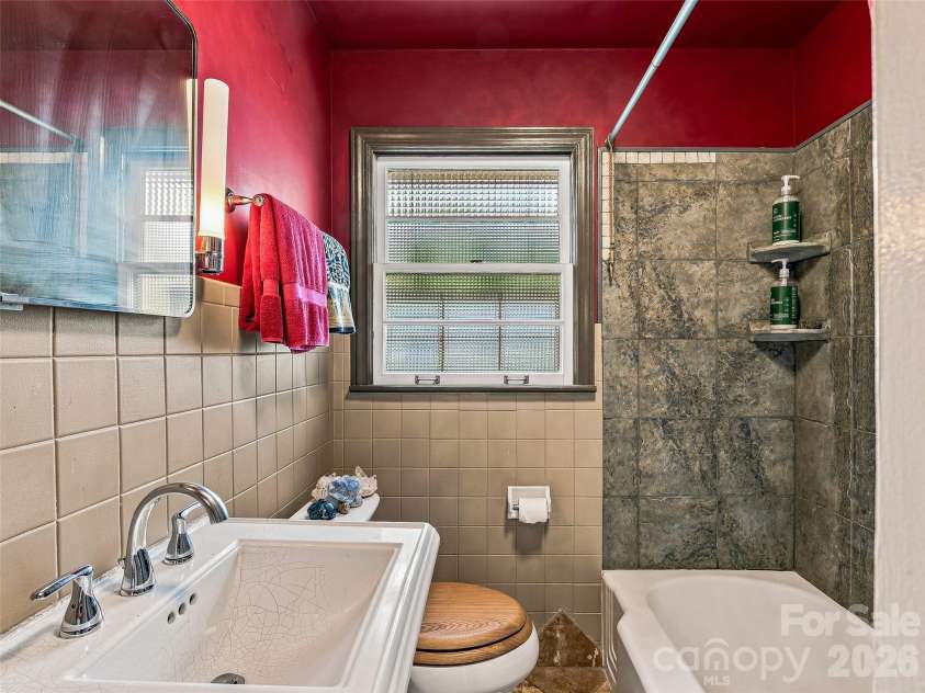 30 Maney Avenue, Asheville, NC 28804.  MLS# CAR4420357, YatesRealty ID 49114. Main level bathroom