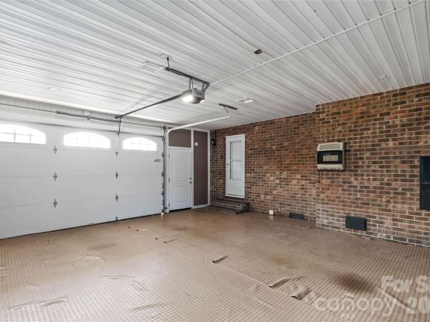 613 Doc Garris Road, Lancaster, SC 29720.  MLS# CAR4419433, YatesRealty ID 49126. Heated garage