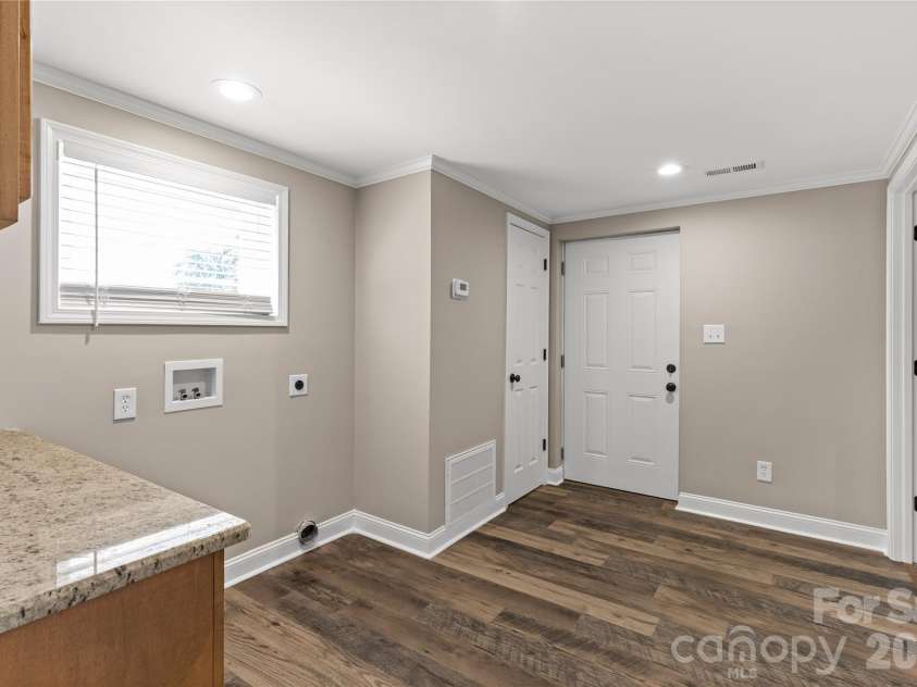 613 Doc Garris Road, Lancaster, SC 29720.  MLS# CAR4419433, YatesRealty ID 49126. Laundry room