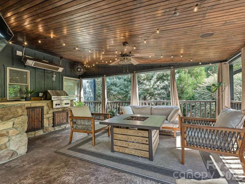 21624 Rio Oro Drive, Cornelius, NC 28031.  MLS# CAR4419384, YatesRealty ID 49127. Outdoor Kitchen Patio with Heaters!!
