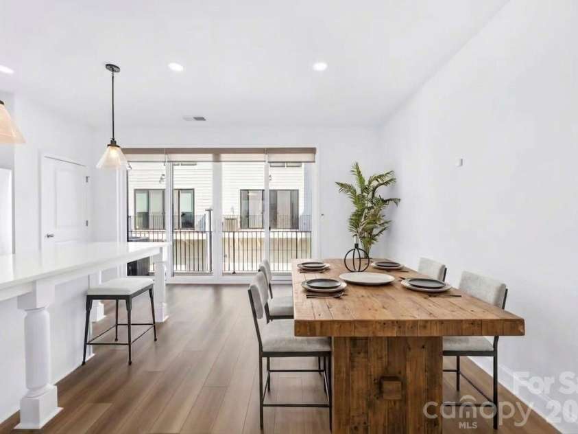 15332 Ballancroft Parkway, Charlotte, NC 28277.  MLS# CAR4419305, YatesRealty ID 49128. Dining table Virtually Staged