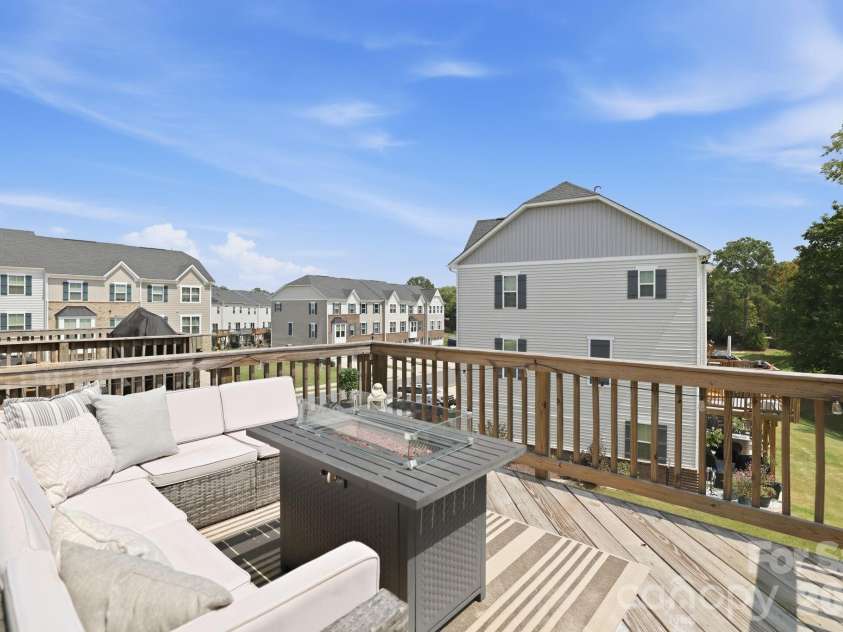 2595 Grantham Place Drive, Fort Mill, SC 29715.  MLS# CAR4418348, YatesRealty ID 49129. 2nd level Rear deck walk out from Kitchen