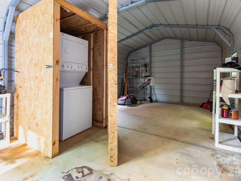 24 Old Berlin Way, Black Mountain, NC 28711.  MLS# CAR4416364, YatesRealty ID 49134. Shed with Laundry