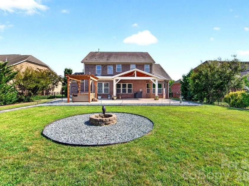 11322 Brangus Lane, Charlotte, NC 28227.  MLS# CAR4414789, YatesRealty ID 49136. Fire pit