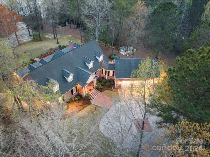 229 Joseph Kershaw Road, Eastover, SC 29044.  MLS# CAR4122309, YatesRealty ID 4915. The second Home, also custom built by Billy Ray Caskey is 5,488 HLA w/632 additional finished unheated sq ft 4 bedrooms (septic is for 3 bedrooms) 4 full & 1 half bath