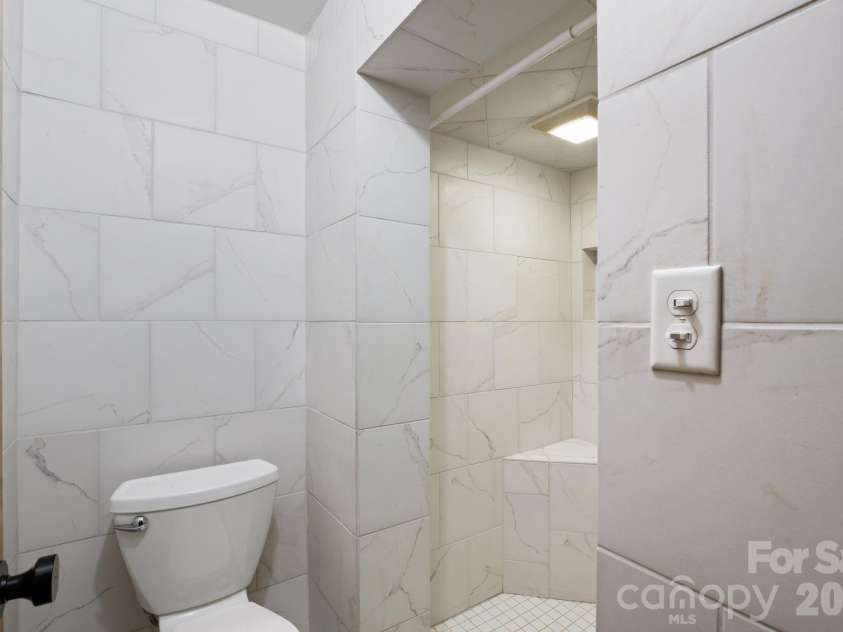 348 Beaucatcher Road, Asheville, NC 28805.  MLS# CAR4420417, YatesRealty ID 49161. Basement full bath
