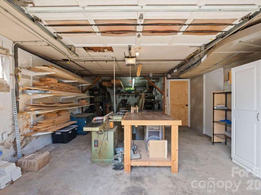 348 Beaucatcher Road, Asheville, NC 28805.  MLS# CAR4420417, YatesRealty ID 49161. Garage/workshop