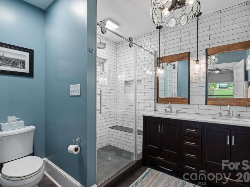 348 Beaucatcher Road, Asheville, NC 28805.  MLS# CAR4420417, YatesRealty ID 49161. Primary bathroom