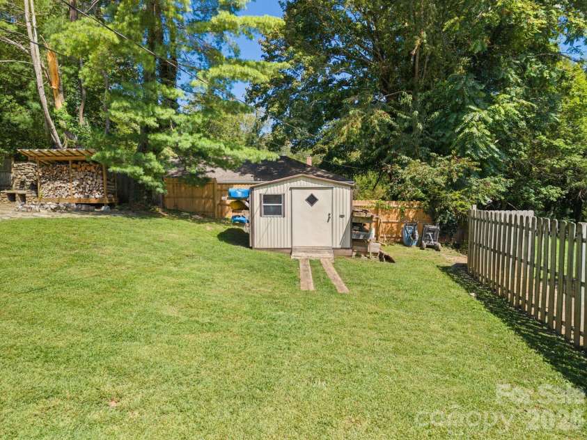 348 Beaucatcher Road, Asheville, NC 28805.  MLS# CAR4420417, YatesRealty ID 49161. Storage shed