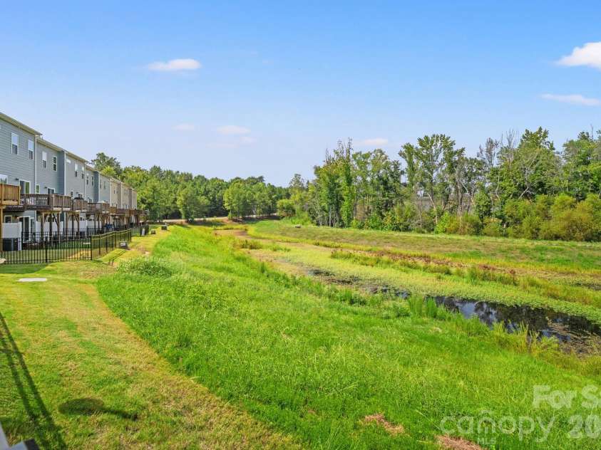 435 Lahinch Drive, Tega Cay, SC 29708.  MLS# CAR4422014, YatesRealty ID 49162. Private Backyard with View of Pond!