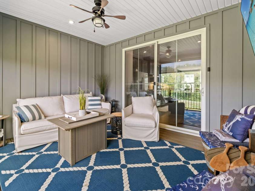 435 Lahinch Drive, Tega Cay, SC 29708.  MLS# CAR4422014, YatesRealty ID 49162. Screened In Porch with Remote Controlled Roller Shade