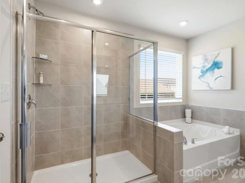 1448 McCollum Street, Monroe, NC 28112.  MLS# CAR4422077, YatesRealty ID 49173. Primary bath