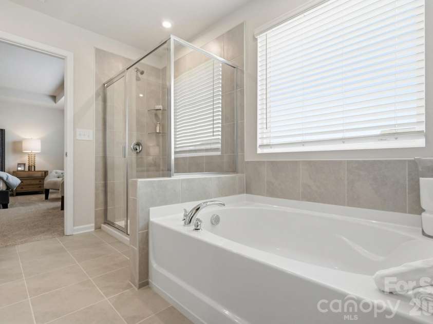 1448 McCollum Street, Monroe, NC 28112.  MLS# CAR4422077, YatesRealty ID 49173. Primary bath