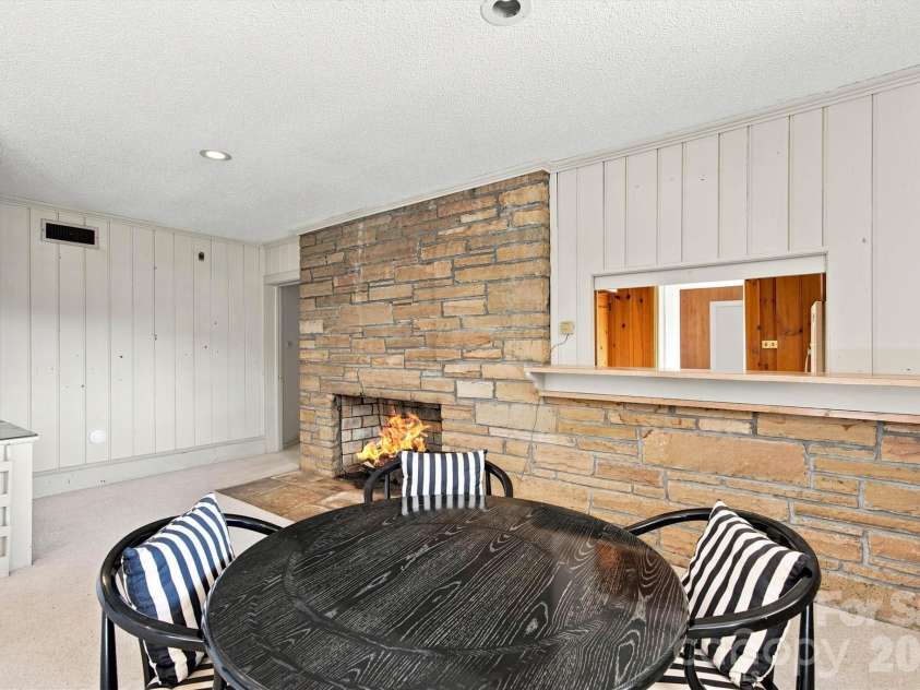 4830 Center Street, Hickory, NC 28601.  MLS# CAR4421553, YatesRealty ID 49176. Basement Dining/Fireplace View