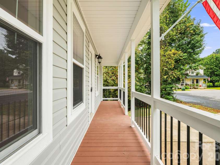 1 Red Clover Drive, Candler, NC 28715.  MLS# CAR4305641, YatesRealty ID 4919. Covered Front Porch