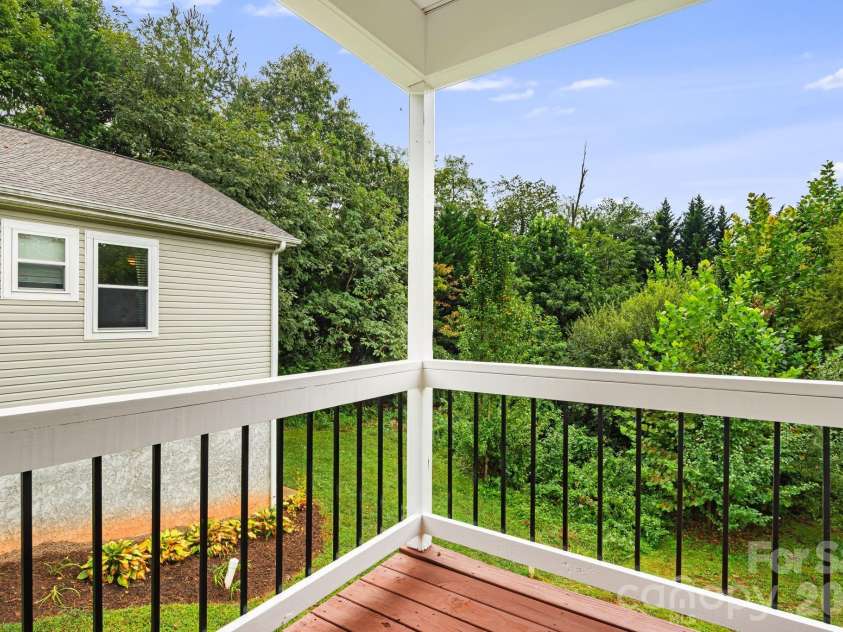 1 Red Clover Drive, Candler, NC 28715.  MLS# CAR4305641, YatesRealty ID 4919. Rear Porch