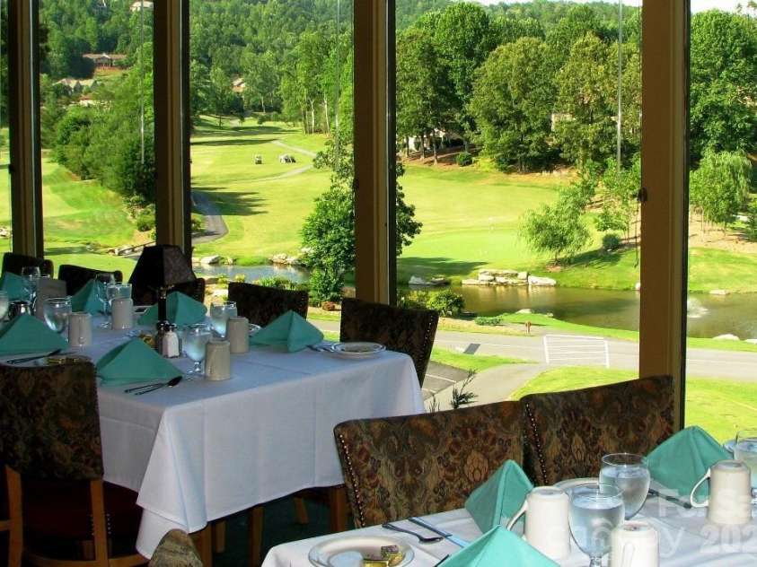 Lot 2 Tomahawk Trail, Hendersonville, NC 28739.  MLS# CAR4419097, YatesRealty ID 49191. Dining with a view