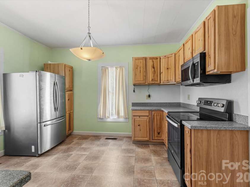 466 Miller Avenue, Marion, NC 28752.  MLS# CAR4421157, YatesRealty ID 49196. 