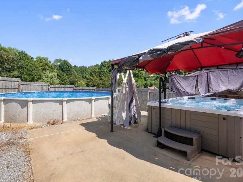 466 Miller Avenue, Marion, NC 28752.  MLS# CAR4421157, YatesRealty ID 49196. Virtually opened pool and hottub