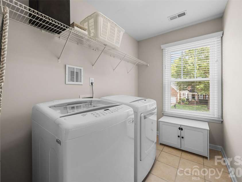 9004 Creekstone Road, Waxhaw, NC 28173.  MLS# CAR4416844, YatesRealty ID 49201. Laundry Room