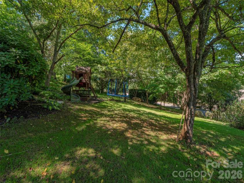 105 Deer Glade Lane, Waynesville, NC 28786.  MLS# CAR4422108, YatesRealty ID 49204. Park-like grounds